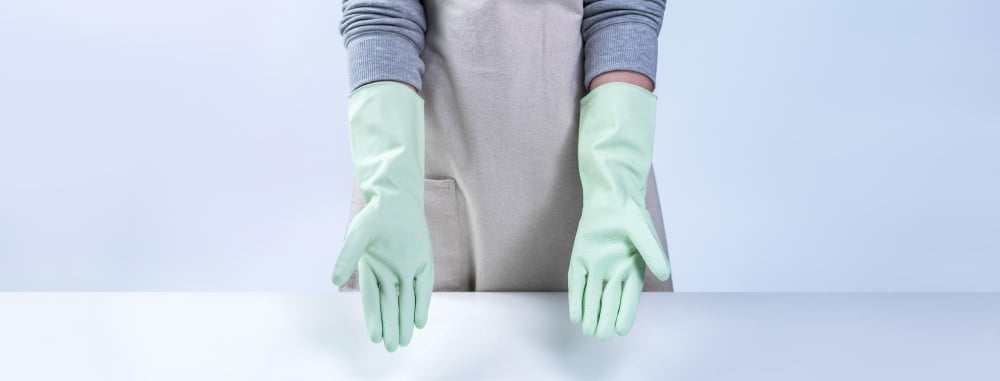 protective gloves and an apron dye mixing