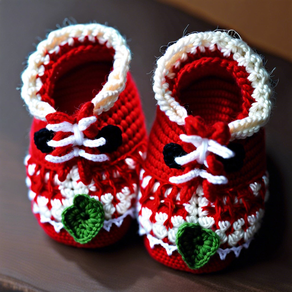 strawberry shaped booties with seed details